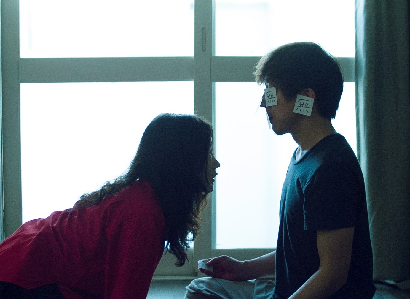 A still from “Not One and Not Two” – Yongmok gets an unexpected visitor while meditating (photo by Seo Bohyung)