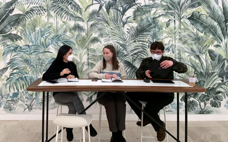 Korea.net staff writers Elias Molina from Costa Rica (right), Aisylu Akhmetzianov from Russia (center) and Anais Faure on Jan. 25 discuss Seollal (Lunar New Year) in Korea at Leema Building Lounge in Seoul's Jongno-gu District. (Choi Jaehyeok)