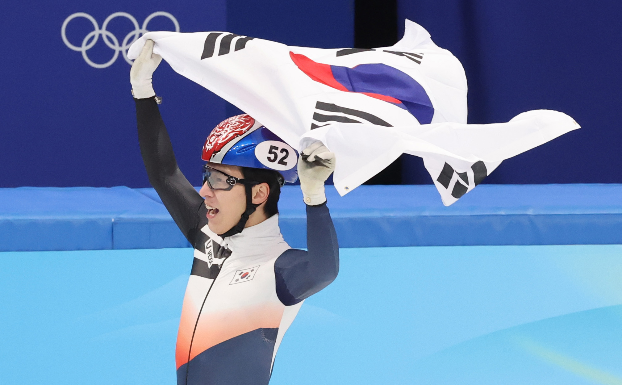 Short-track speed skater Hwang Dae-heon on Feb. 9 celebrates after winning the men's 1,500-m race of the Beijing Winter Olympics at Capital Indoor Stadium in the Chinese capital. 