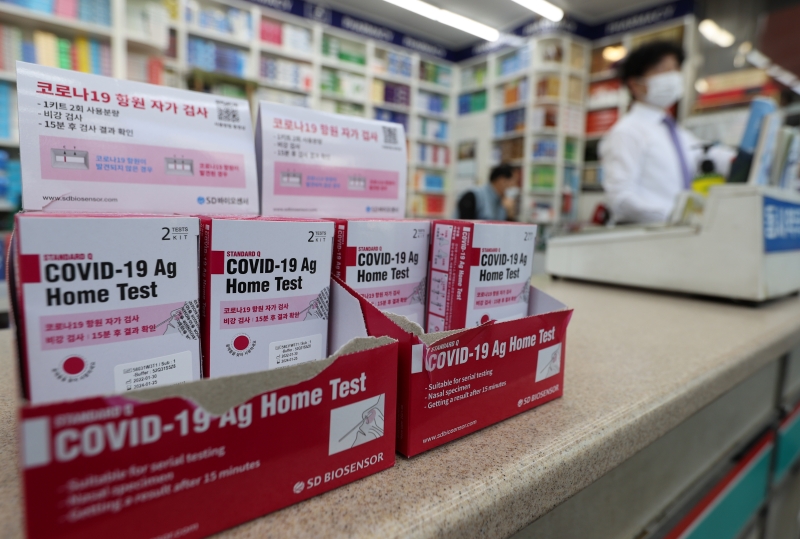 An estimated 50,000 convenience stores nationwide from Feb. 15 began selling self-testing kits for COVID-19. Shown are kits on Feb. 6 on display at a pharmacy in downtown Seoul. 