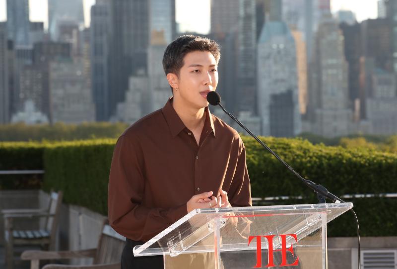 RM, leader of the K-pop boy band BTS, has received a plaque of appreciation from the Cultural Heritage Administration for his contributions to preserving and restoring Korean cultural heritage held overseas. He is shown in September last year giving a speech at the Metropolitan Museum of Art in New York. (Yonhap News) 