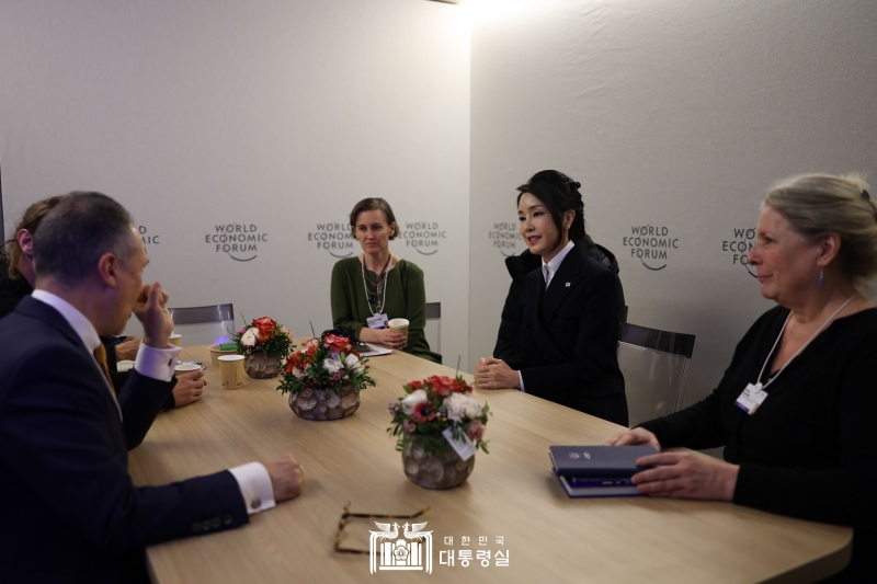 First lady Kim Keon Hee (second from right) on Jan. 18 speaks to artists invited to an event for