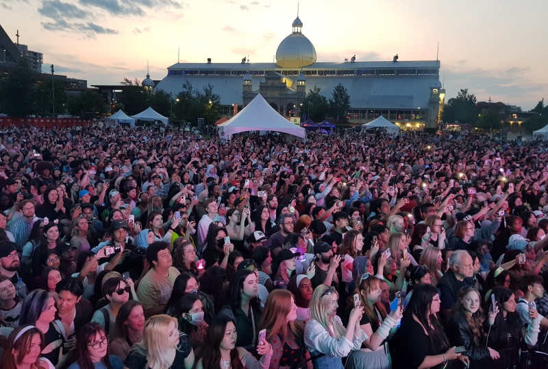 K-Festa visitors on June 10 watch a performance by the K-pop group Kingdom at the K-Pop Cover Dance Festival in Canada held at Lansdowne Park in Ottawa, Canada.