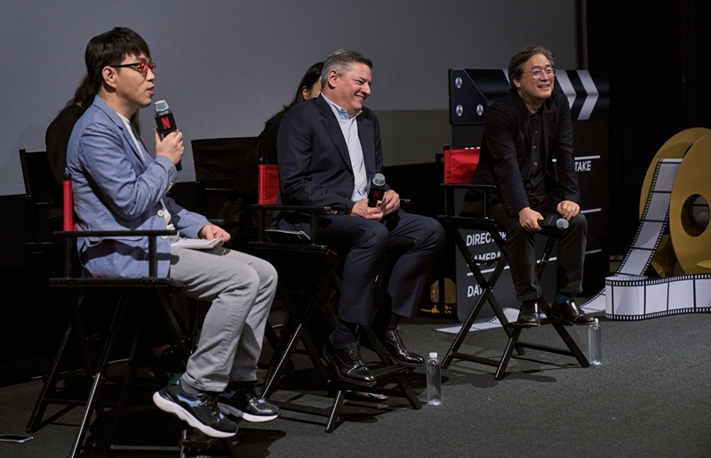 Netflix Co-CEO Ted Sarandos (center) on June 21 attends a talk with award-winning director Park Chan-wook (right) and 100 film students at Park Chan-wook Hall of CGV Yongsan I'Park Mall in Seoul's Yongsan-gu District, with movie critic Lee Dong-jin (left) acting as host. (Netflix) 