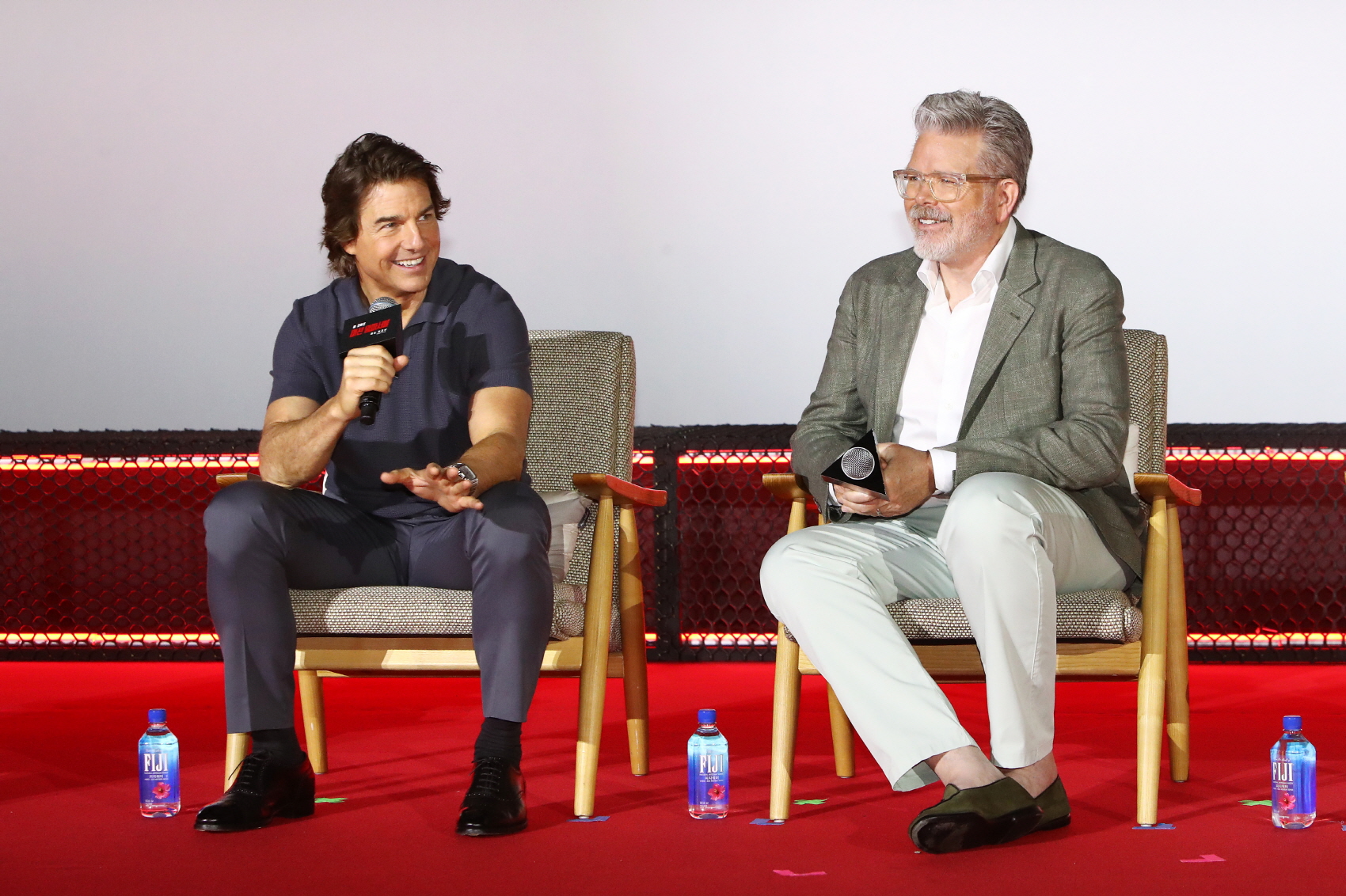 Hollywood star Tom Cruise (left) on June 29 answers questions from reporters at a news conference for the domestic premiere of 