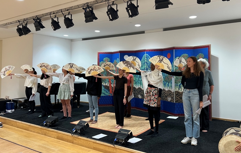 Participants at a pansori (traditional lyrical opera) workshop use a traditional fan during the event at the Korean Cultural Center in Brussels, Belgium. The workshop ran from Aug. 21-26. 