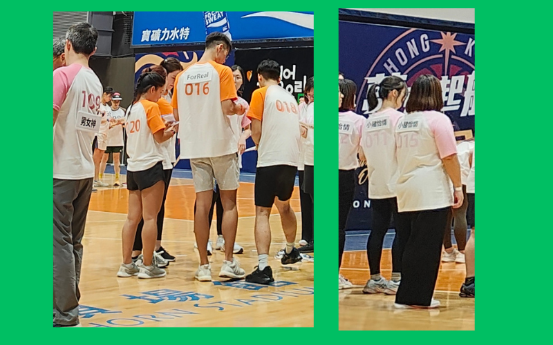 Participants stick name tags to their backs in playing the 