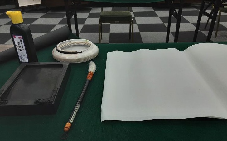 Munbangsawoo refers to the four essential tools of Hangeul calligraphy: paper, brush, ink and ink stone. (Hurum Maqshuro)