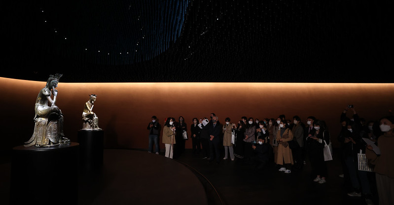 A media event on Nov. 11, 2021, opens the new gallery Room of Quiet Contemplation, which features the two famous gilt-bronze Buddhist statues 