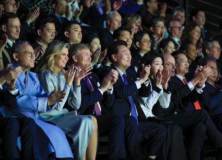 President Yoon Suk Yeol (fourth from left) and first lady Kim Keon Hee (fifth from left) on Dec. 13 watch the performance 