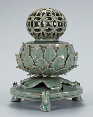 Celadon Incense Burner with Openwork is small at 15.3 cm tall and a diameter of 11.5 cm, but remains a leading work illustrating the outstanding handicraft culture of the Goryeo Dynasty. (National Museum of Korea)