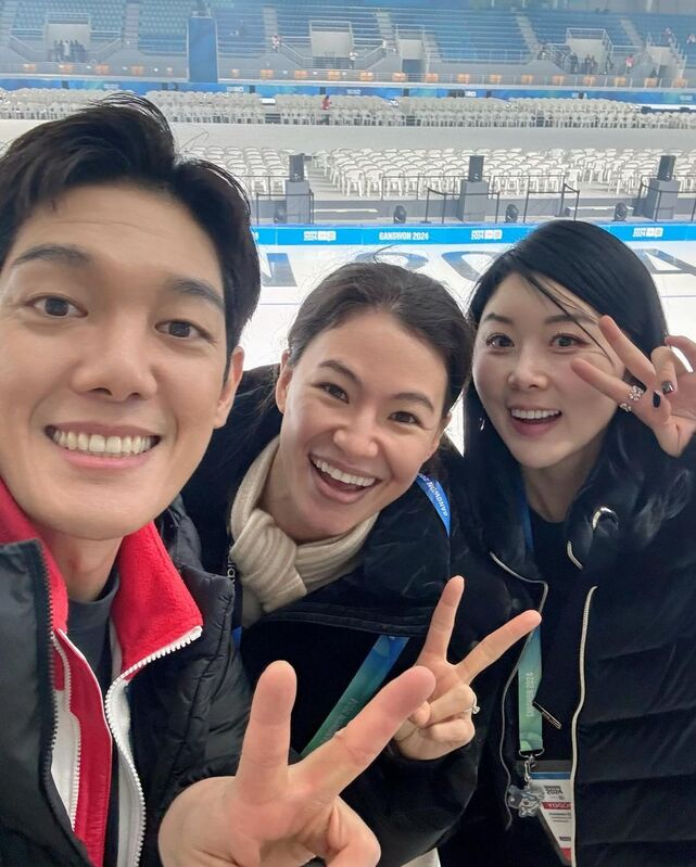 Olivia Ih (center) poses with other emcees at the Gangwon Youth Winter Olympics.