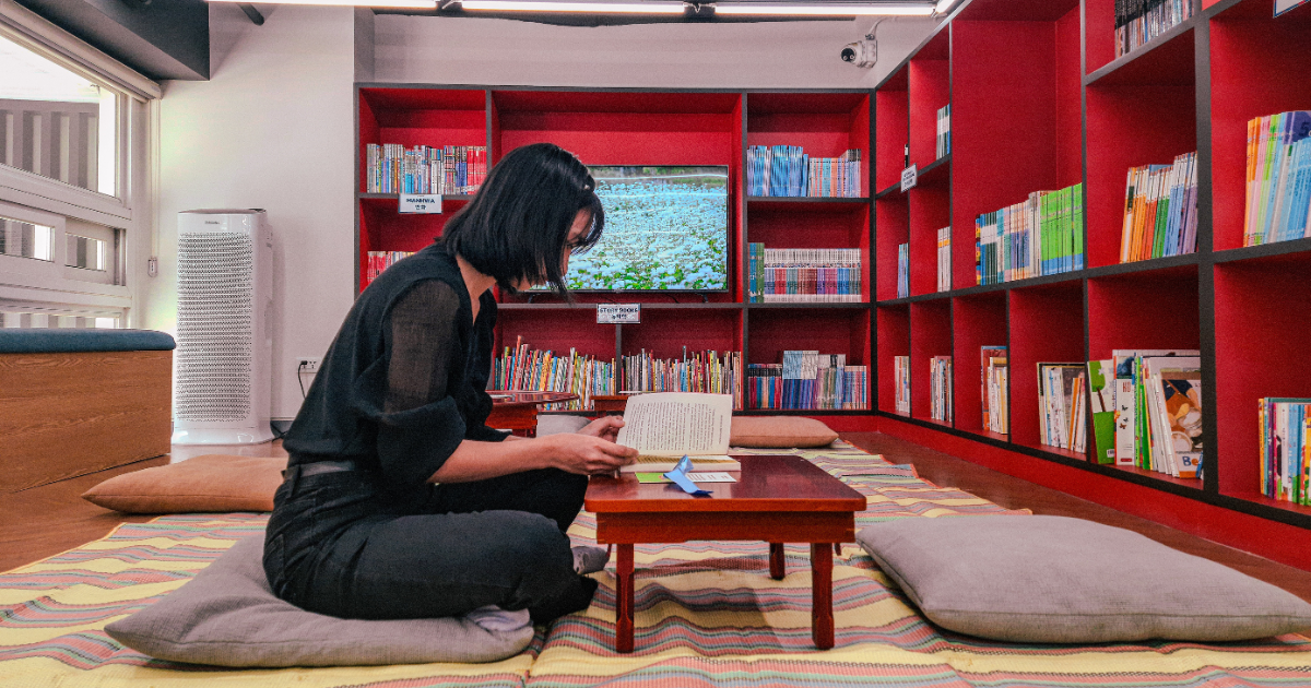 I read my book within the cozy confines of the reading nook.