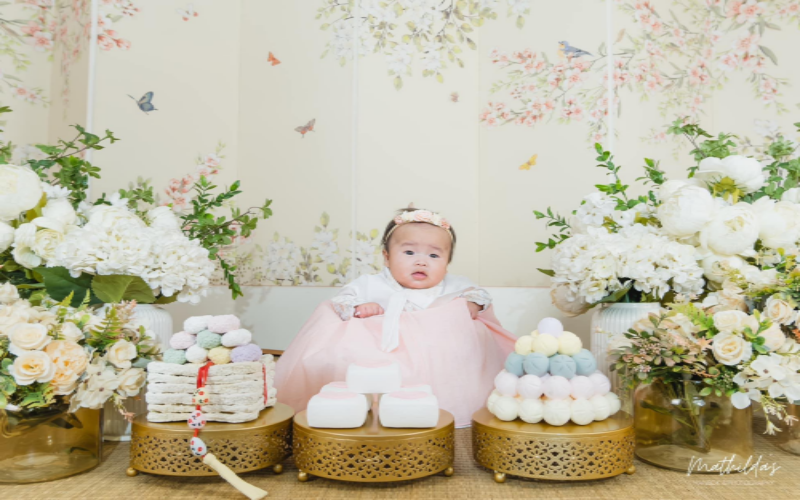 This photo taken on Aug. 25, 2023, is of a baby at her 100th-day celebration at Mathilda's Hanbok and Photography in Santa Rosa, the Philippines. 