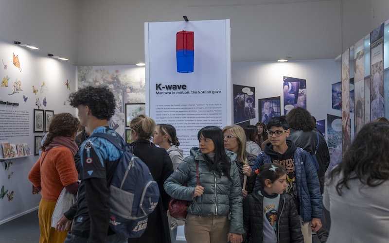 Visitors check out the manhwa exhibition at the Comicon in Naples, Italy. (Comicon)