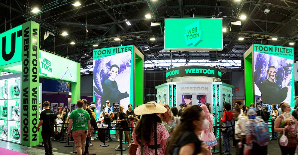 Four national strategies for domestic content development were announced on June 18 to propel the country into the world's top four in the content industry. Shown is the Naver Webtoon booth in July last year packed with visitors at the pop culture event 