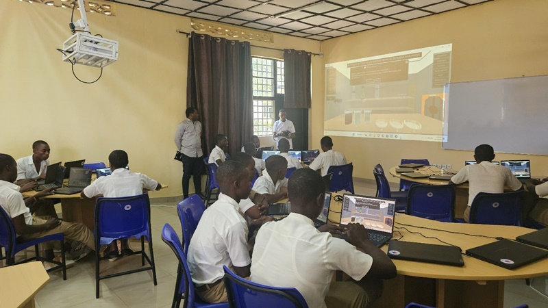 Students on June 19 attend a class at the newly opened smart classroom at the school Groupe Scolaire Dihiro in Rwanda.