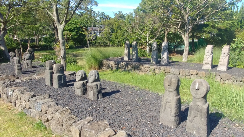 Dongjaseok (statues of children) installed in front of graves on Jeju Island are mostly made of volcanic rocks such as basalt or andesite. The simple facial features on the round face give off a warm feeling, and the head is either shaved or shows a braid. 