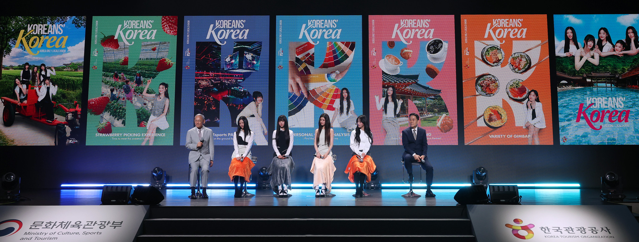 Minister of Culture, Sports and Tourism Yu In Chon (left) on July 11 introduces videos promoting travel in the country featuring NewJeans at the ceremony for the girl group's appointment as honorary ambassador of Korea tourism at the Grand Hyatt Seoul in Seoul's Yongsan-gu District. 
