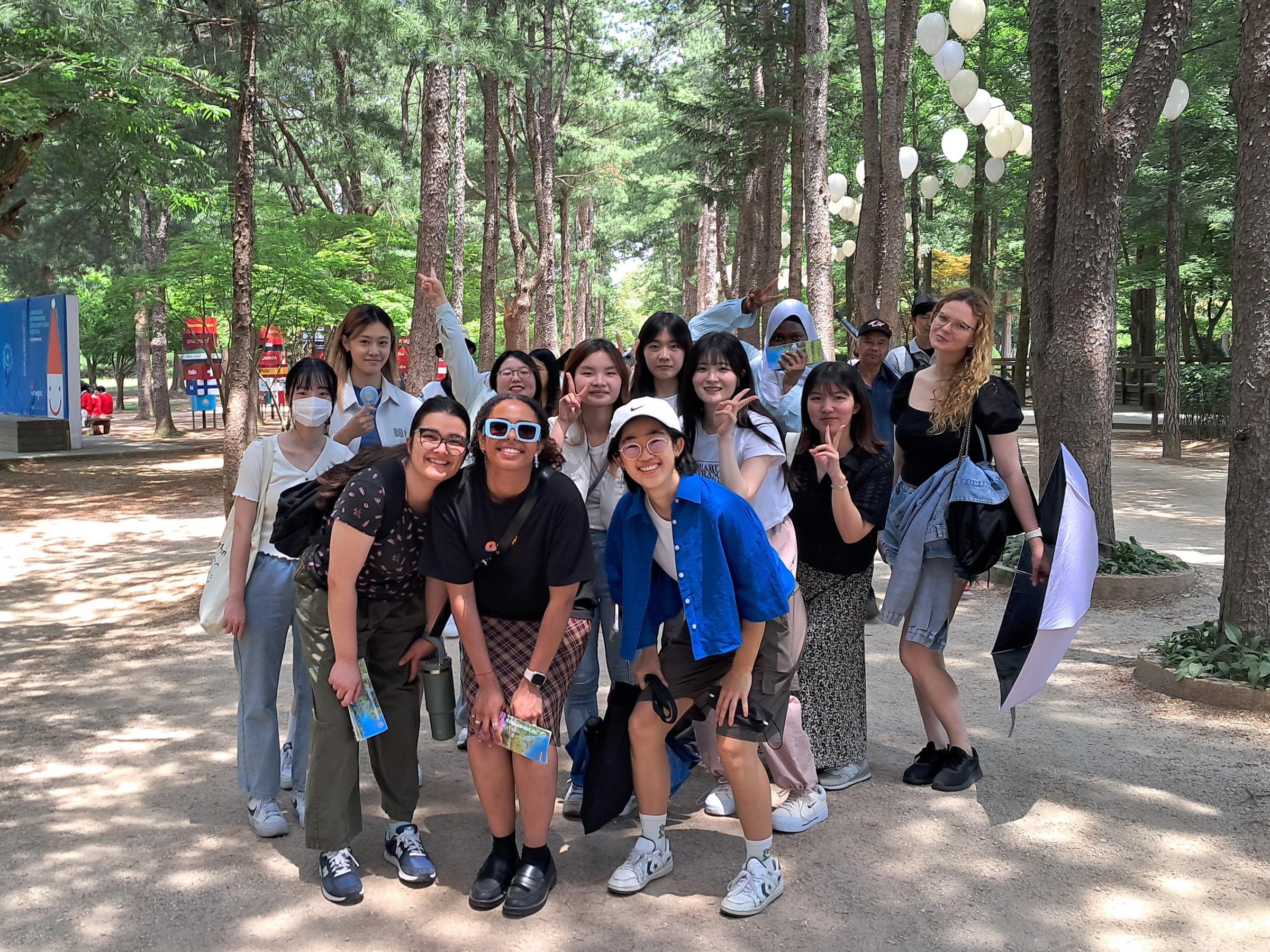 The number of international students exceeded 200,000 in the first half of this year for the first time. Shown are students of Korean at Ewha Womans University on June 21 posing for photos on Nami Island in Chuncheon, Gangwon-do Province. (Ewha Womans University)  
