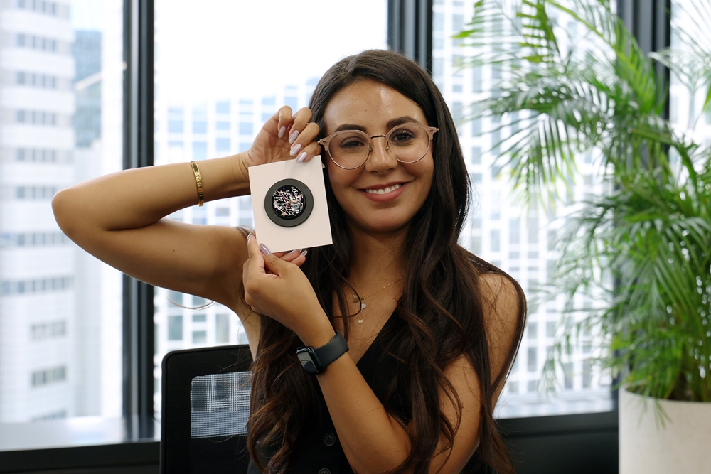 Nadia Ghandi poses for the camera on Aug. 9 after making a MagSafe pop socket with designs in Hangeul (Korean alphabet) at Seoul Culture Lounge in Seoul's Jongno-gu District. 