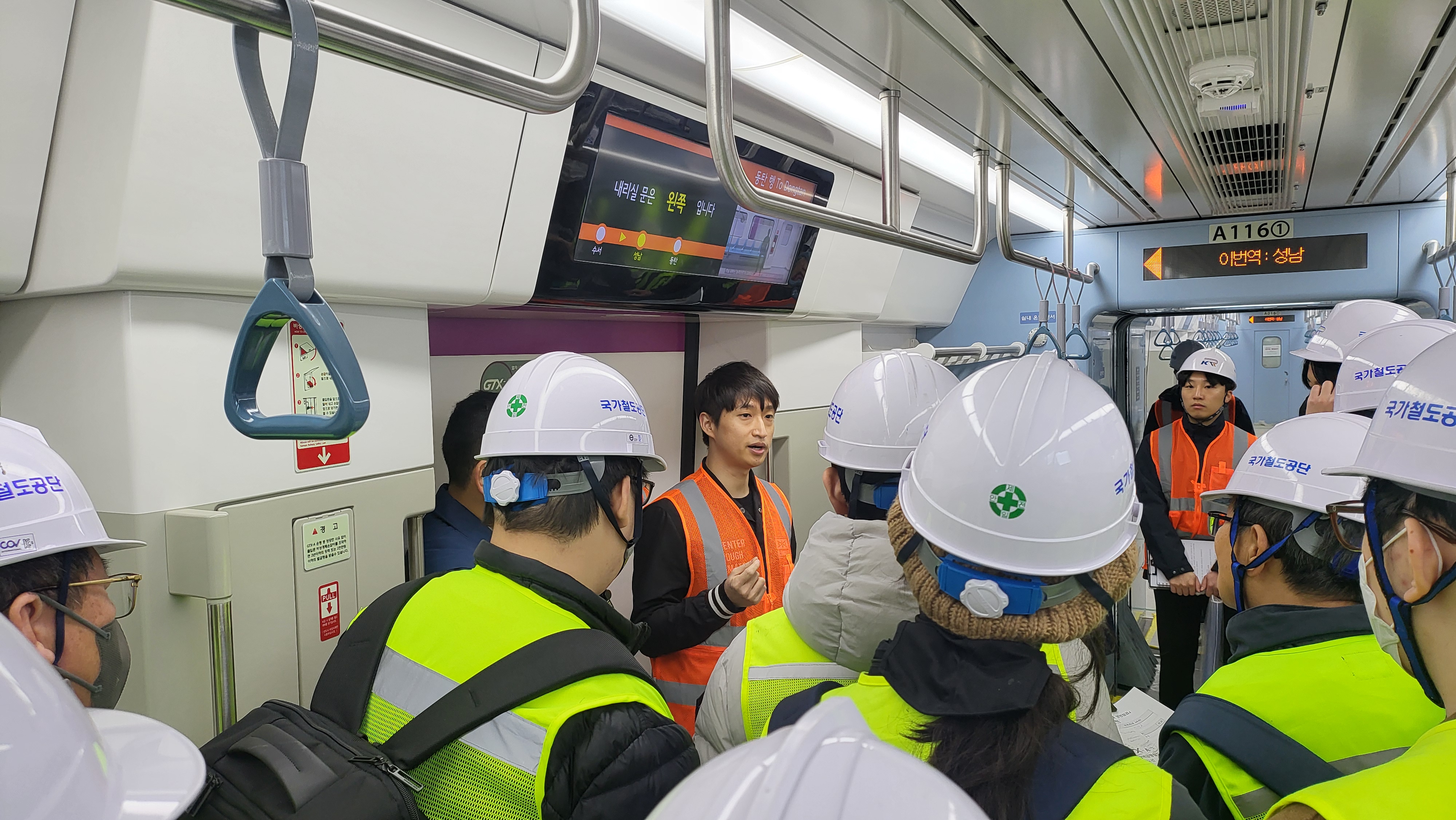 A public safety inspection team on March 19 listens to an explanation about the safety and convenience of the GTX-A.