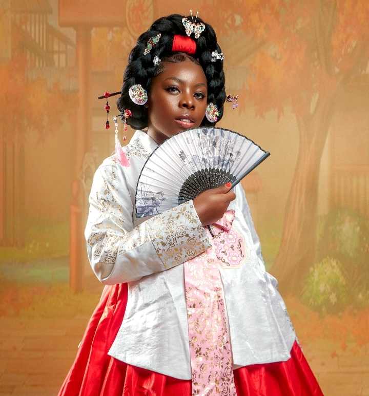 Godwin Stella, Stella in a Hanbok dress which she used in her K-community challenge 