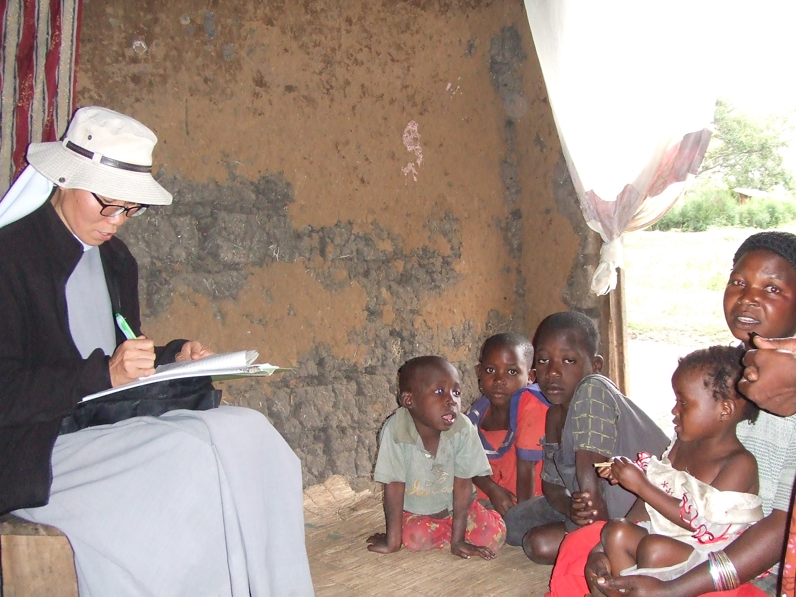 Sister Hwang Gyeong-sun visits several regions in Uganda to provide practical help to the needy.