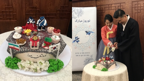 Mr. Ambassador and Lady Shin are cutting the cake. (Nasim Gerami)