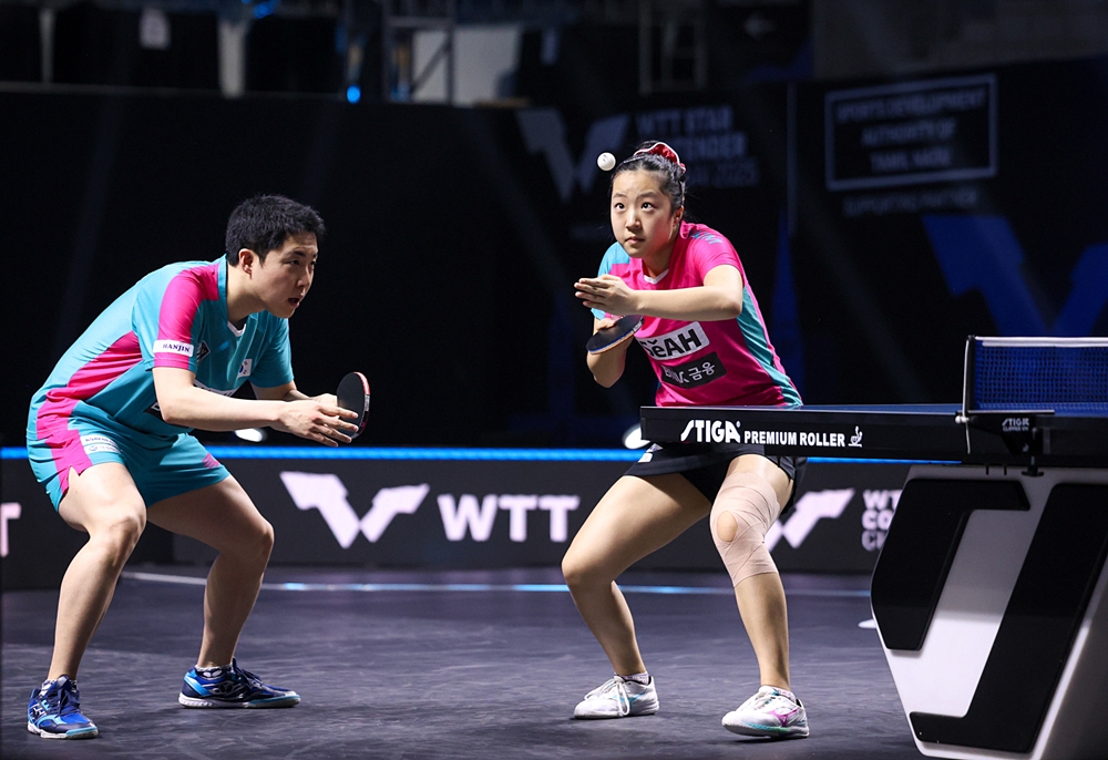 Table tennis stars Shin Yu-bin (right) and Lim Jonghoon on March 30 compete in the mixed doubles final against Japan's Maharu Yoshimura and Satsuki Odo at the World Table Tennis' (WTT) Star Contender Chennai 2025 in Chennai, India. (WTT)  