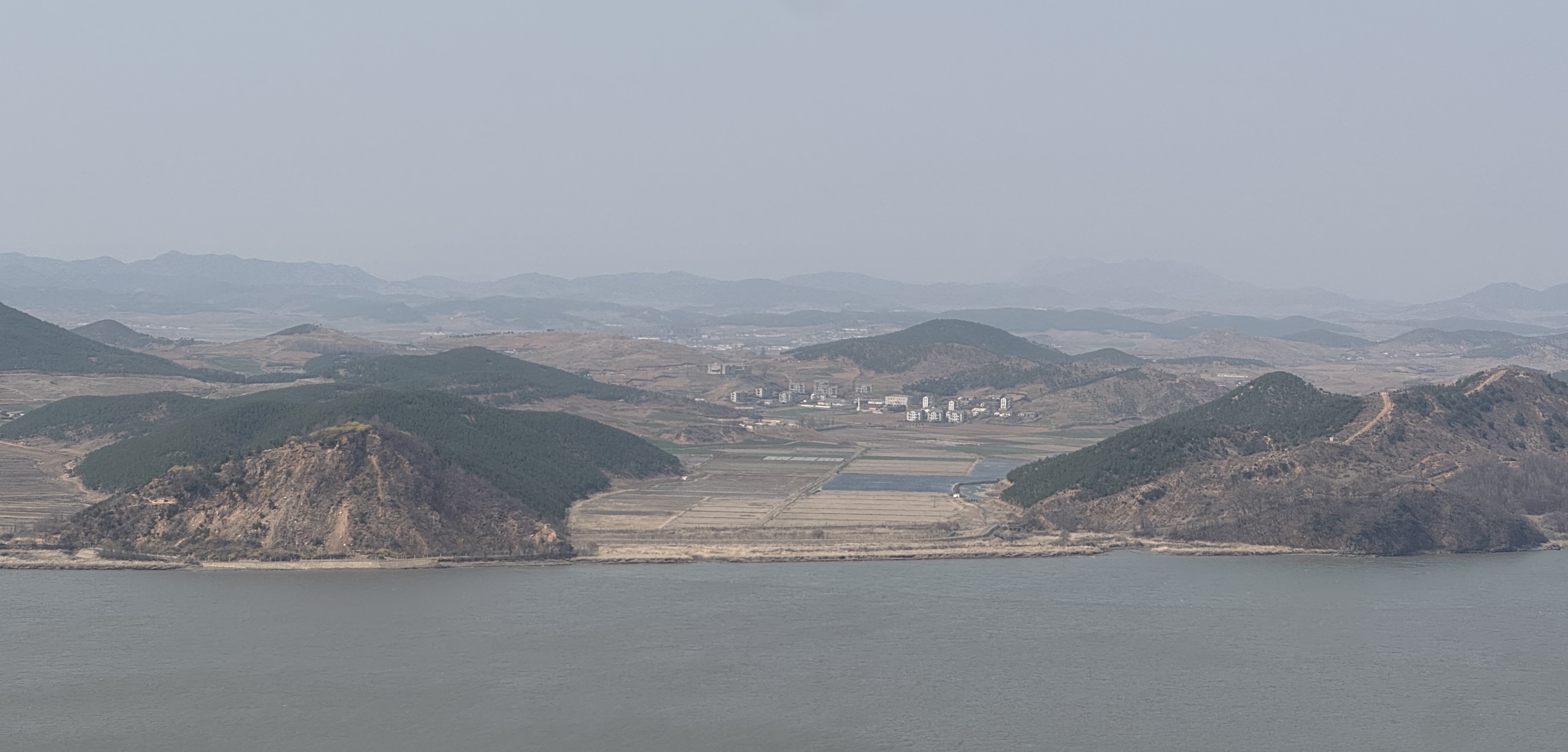This is a view of Gaepung-gun County of North Korea as seen from Aegibong Observatory in Gimpo, Gyeonggi-do Province. Visitors can use an augmented reality-based telescope on cloudy days. 