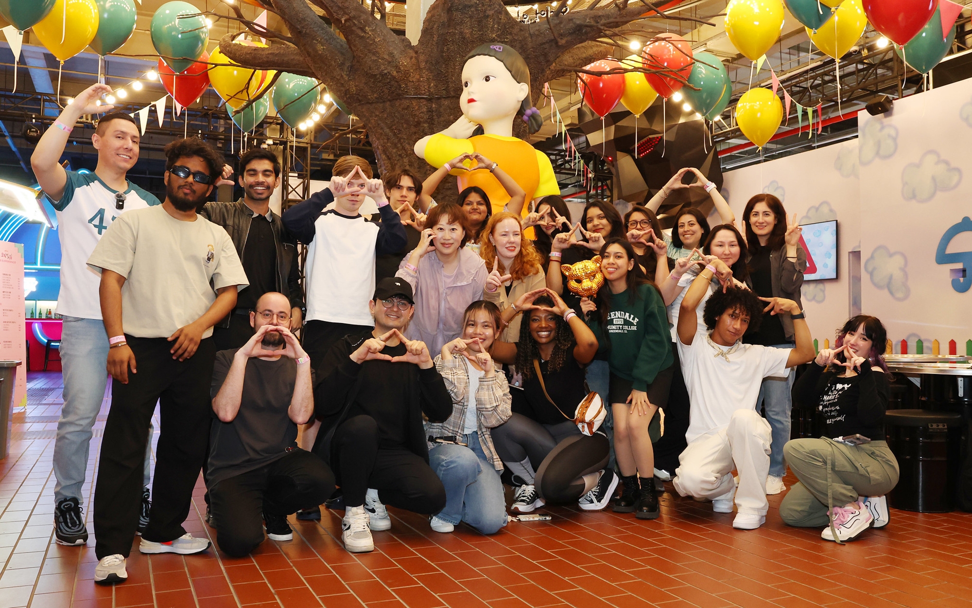 Twenty-three creators of Korean cultural content -- 10 Korea.net Honorary Reporters and 13 K-influencers -- on May 29 take a group photo at 