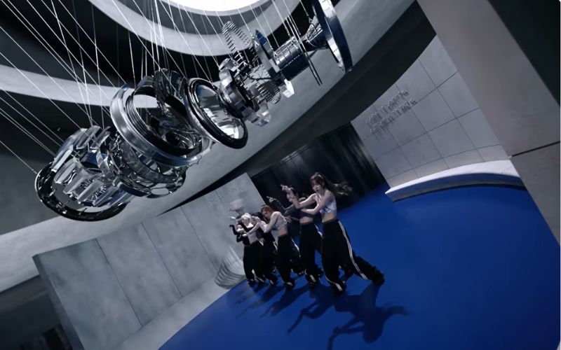 A screenshot from NMIXX’s official “Know About Me” music video showcases Park’s Glasspunk-styled artwork. 