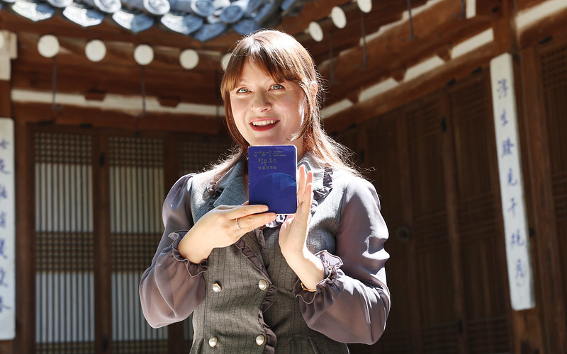 A proud Kuvvet Ayse of Turkiye (Turkey) on June 12 shows her Korean Heritage Passport with all 76 stamps at Korea House in Seoul's Jung-gu District. 