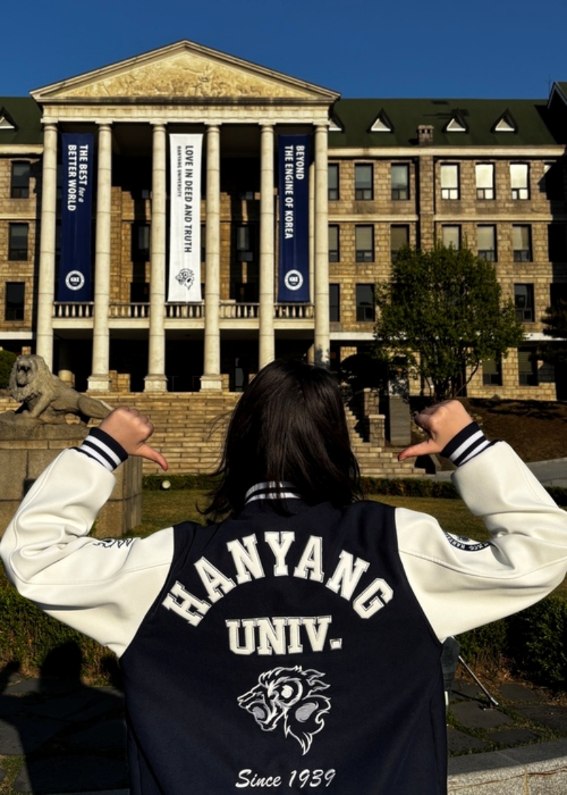 Ioana standing proudly in front of Hanyang University, dressed in the official jacket, (Ioana Filipenko)