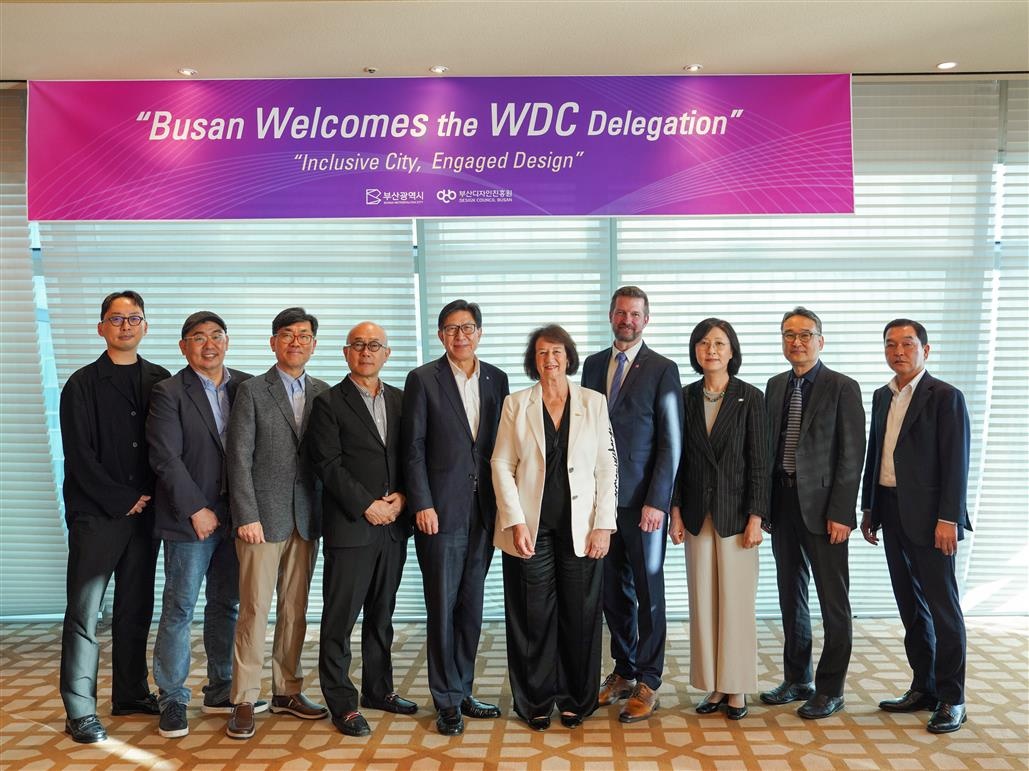 Busan has been named the 2028 World Design Capital by the World Design Organization. Shown above is a group photo of those who attended the event that decided the designation. (Busan Metropolitan Government)  