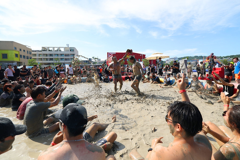 Two men face off in a showdown at Mud Expo Plaza, the main venue of the Boryeong Mud Festival. 