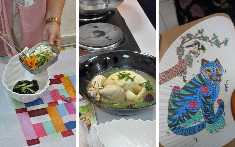 The image on the right shows a traditional 'Buchae' fan decorated with a tiger and a crow, two important symbols in Korean culture. In the center is 'Samgye-tang' prepared by the director of the King Sejong Institute in Amman, and on the left, 'Oi-naengguk' also prepared by the institute’s director.