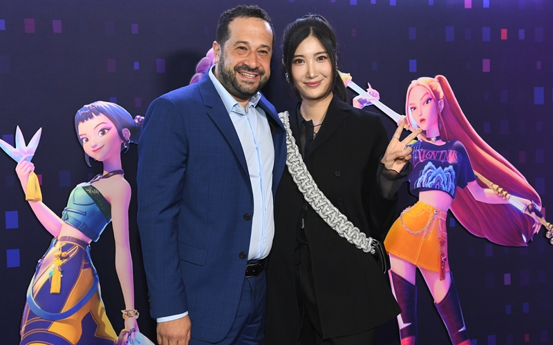 Ian Eisendrath (left) and singer EJAE, who provides the singing voice for the character Rumi, attend the special screening of KPop Demon Hunters at Netflix Tudum Theater in Los Angeles on June 16, 2025. 