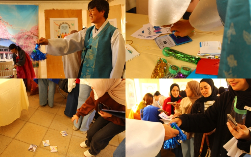 Students engaging in the traditional Korean games zone. (Aseel Al Sailawi).