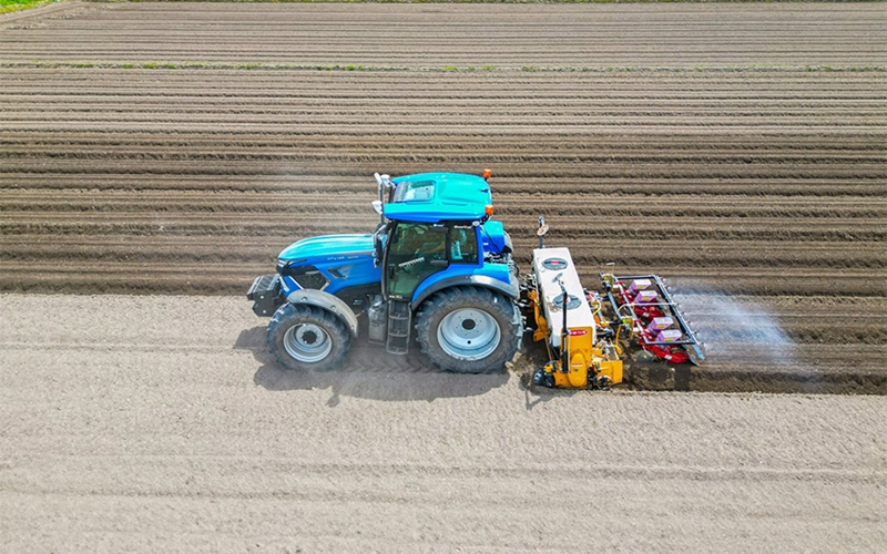 A driverless tractor plants soybeans. (LS Tractor) 