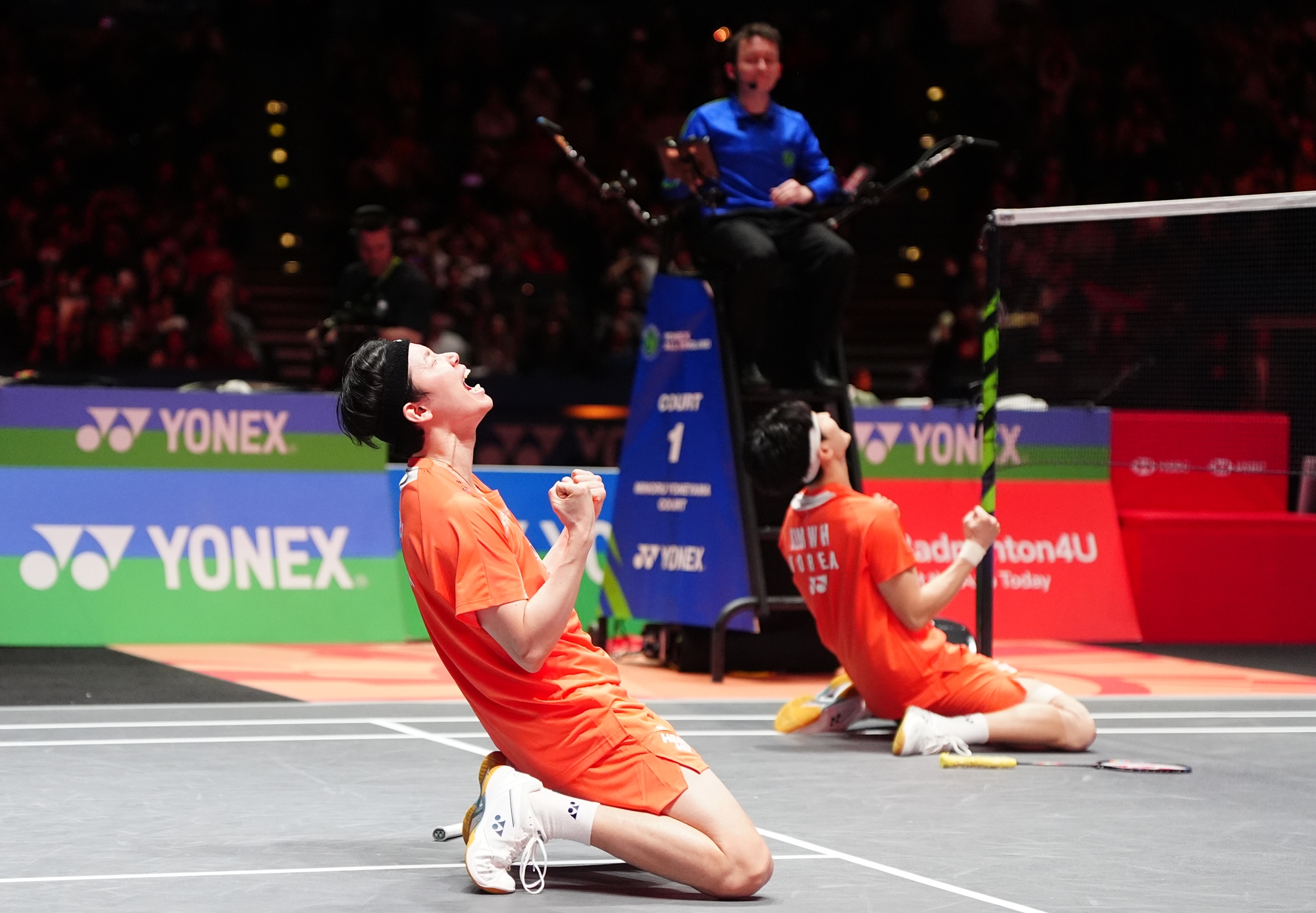 Seo Seung Jae and Kim Won Ho, the world's top-ranked men's badminton doubles team, on March 8 celebrate after winning their second consecutive title at the All England Open at Utilita Arena Birmingham in the U.K.'s No. 2 city of Birmingham. 