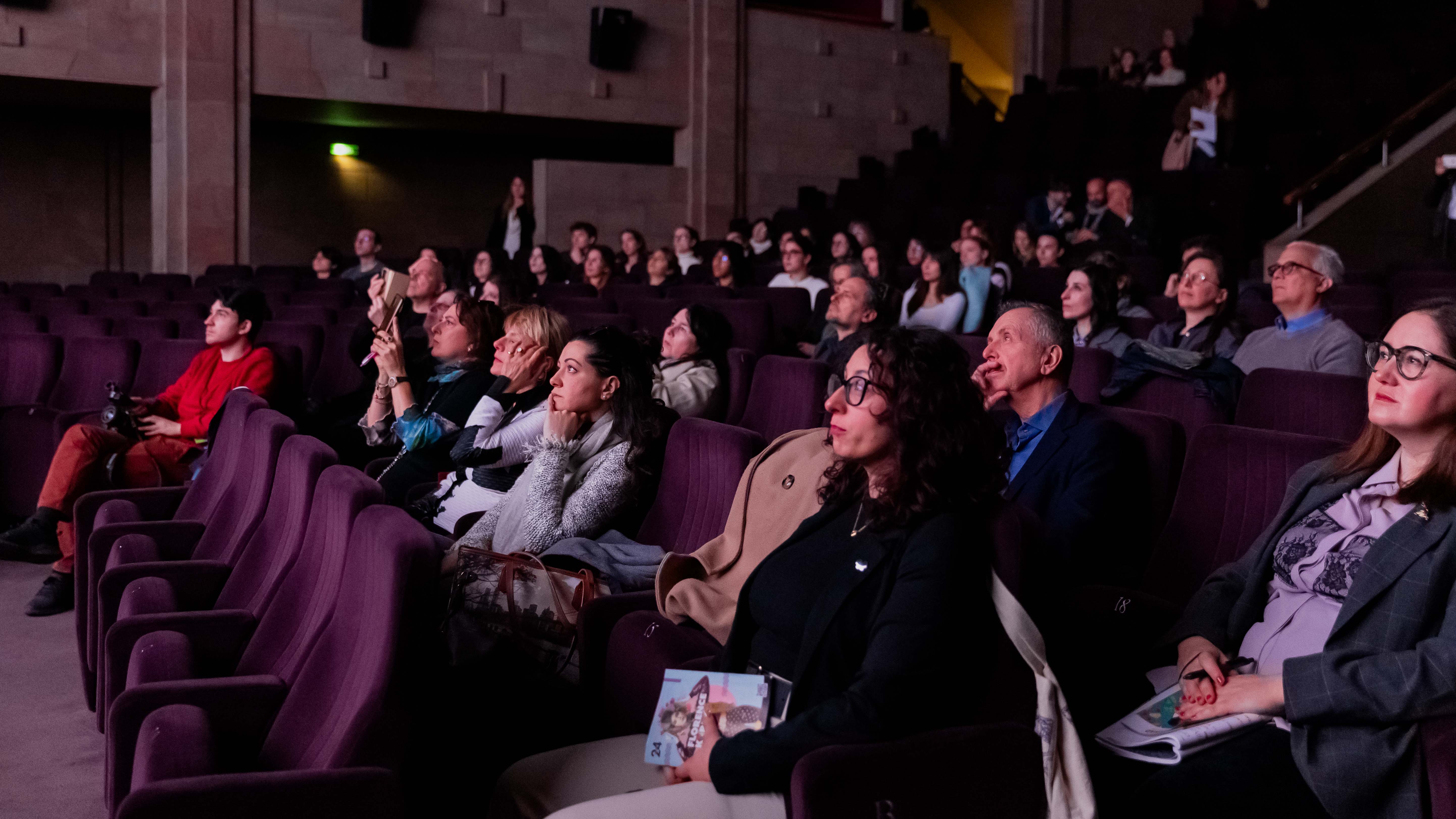 People attended the press conference on March 10, 2026, at La Compagnia Cinema in Florence.
