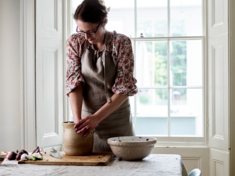 Jo Webster in the kitchen preparing fermented foods.