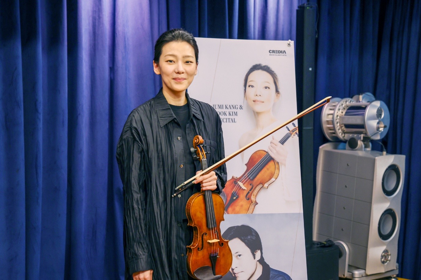 Violinist Clara-Jumi Kang on May 7 poses for a photo at a news conference held at the studio of Credia Classic Club in Seoul's Jongno-gu District.    
