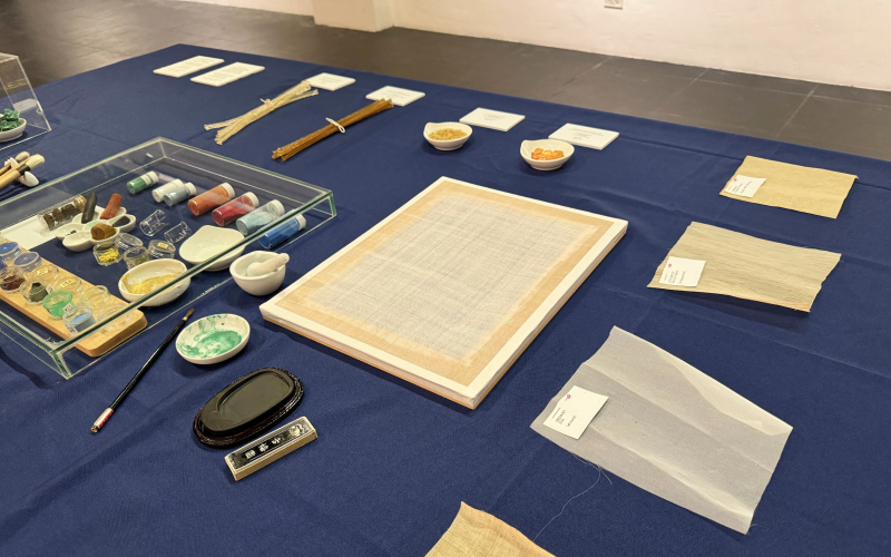 Various materials used in traditional Korean painting, including brushes, pigments, adhesives and textile canvases, are displayed at the exhibition.