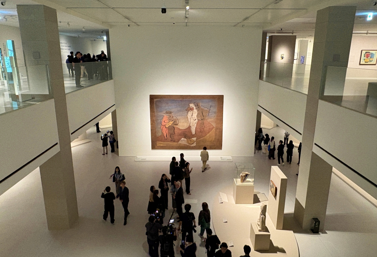 Participants at a news conference on May 19 browse Exhibition Hall 2 of Centre Pompidou Hanwha ahead of the museum's official opening on June 4. At the center is the Pablor Picasso work 