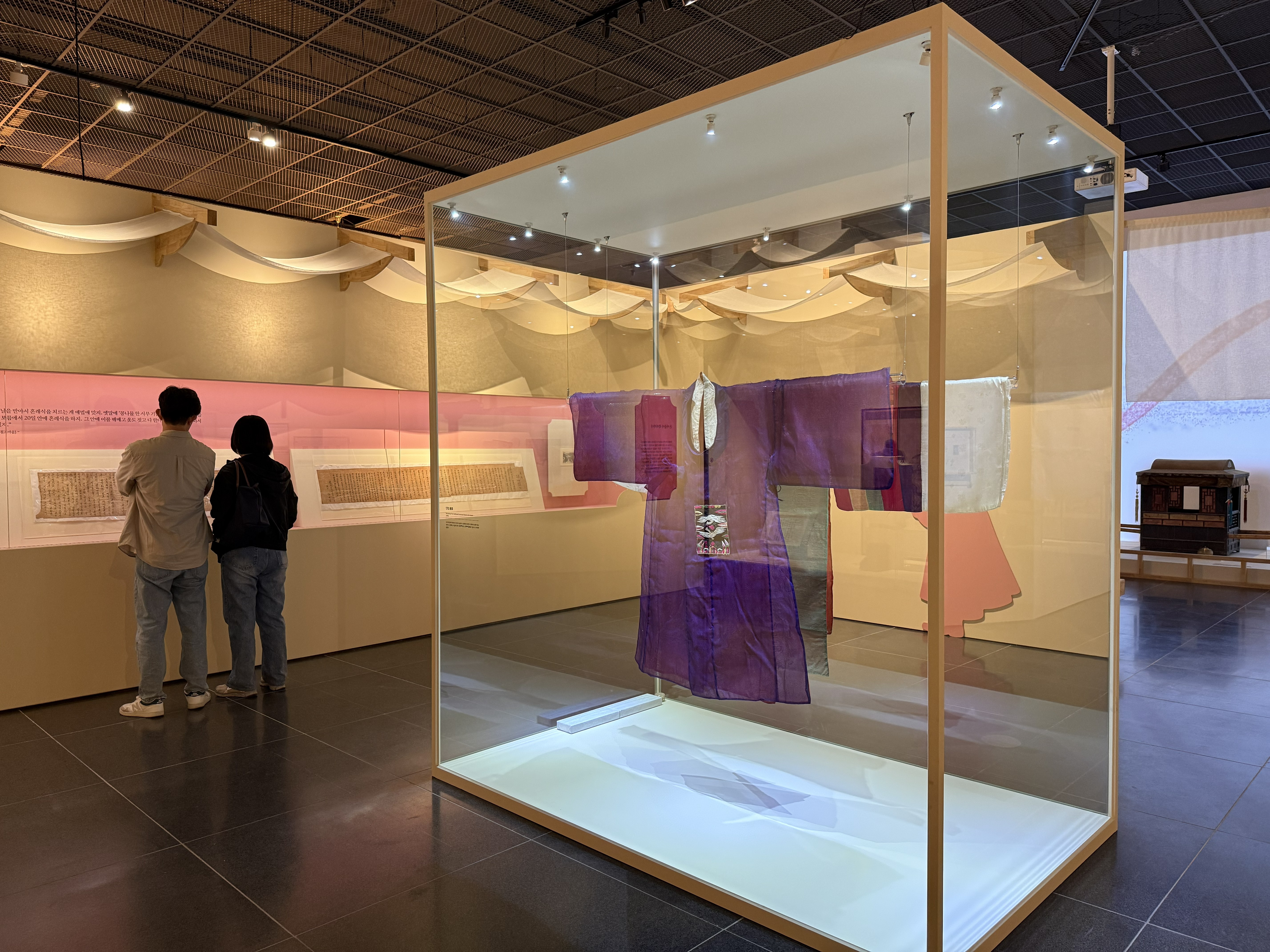 Visitors on May 23 view historical wedding records at the Ulsan Museum exhibition 