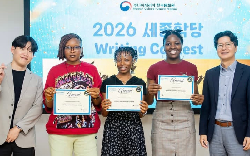 KCCN staff Han, third position Mirabella, first Position Prisca, second position Ene and KCCN Director Jeon Ju Ho pose for a photo. 
