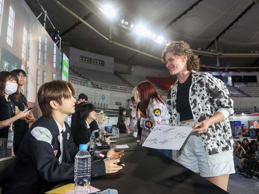 K-pop boy band TNX on June 19, 2025, sign autographs at the Korean content gala MyK Festa at SK Olympic Handball Gymnasium of Olympic Park in Seoul's Songpa-gu District. (Ministry of Culture, Sports and Tourism)  